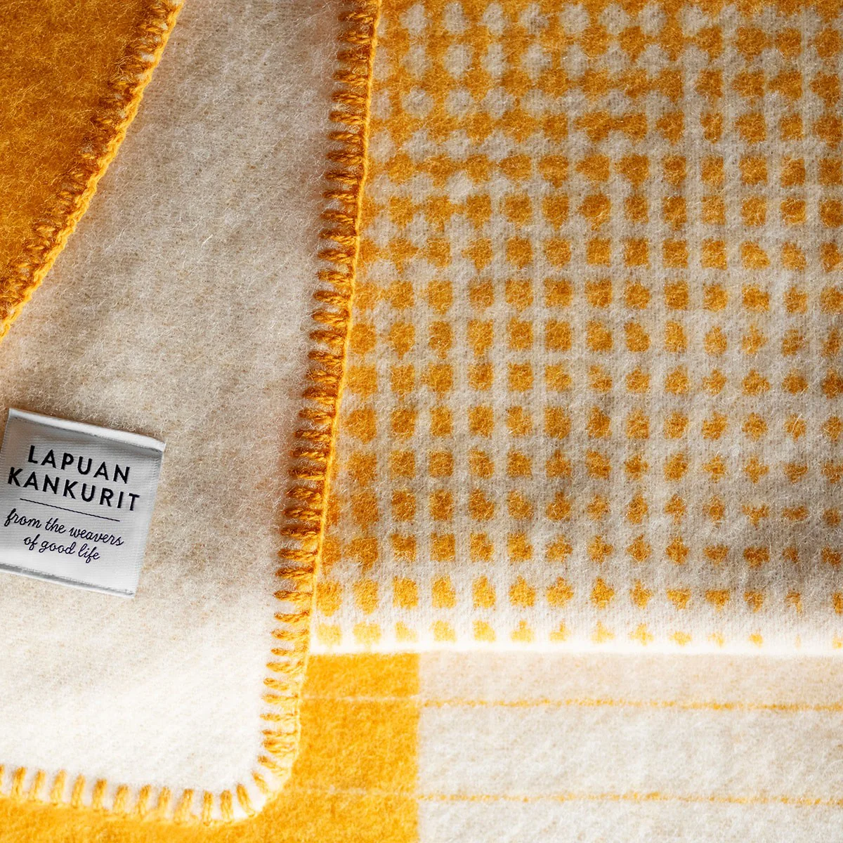 Lapuan Kankurit Kaamos Coffee Dyed Orange / White Wool Blanket - Image 4